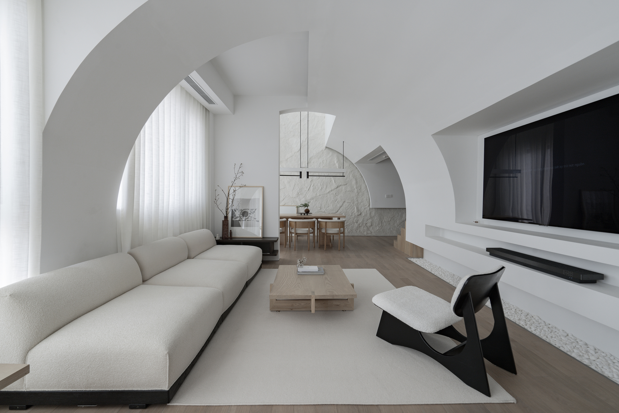 TS Lunar Cavern Duplex Residence / TAA Design + Khoa Vu